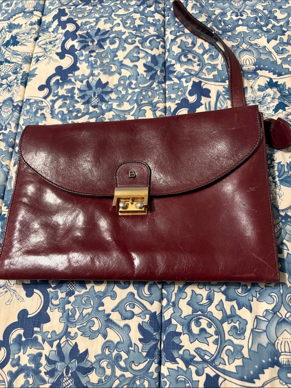 Bally Burgundy Leather Wristlet Clutch with Gold Hardware